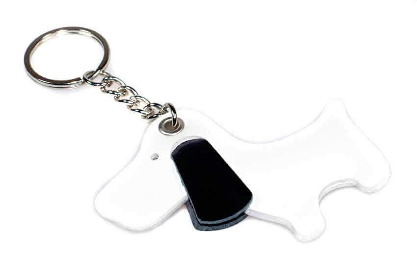 White dog with black ears leather key ring