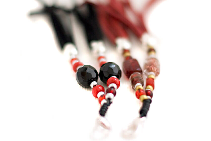 Red and black collar tassels