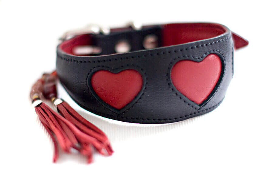 Soft padded black leather hound collar with red hearts and red collar tassel