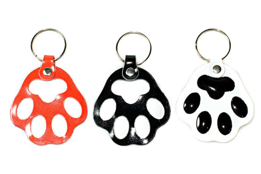 Red, black and white dog paw key rings