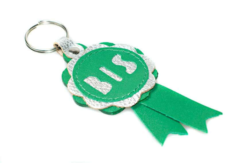 BIS rosette in green and silver leather