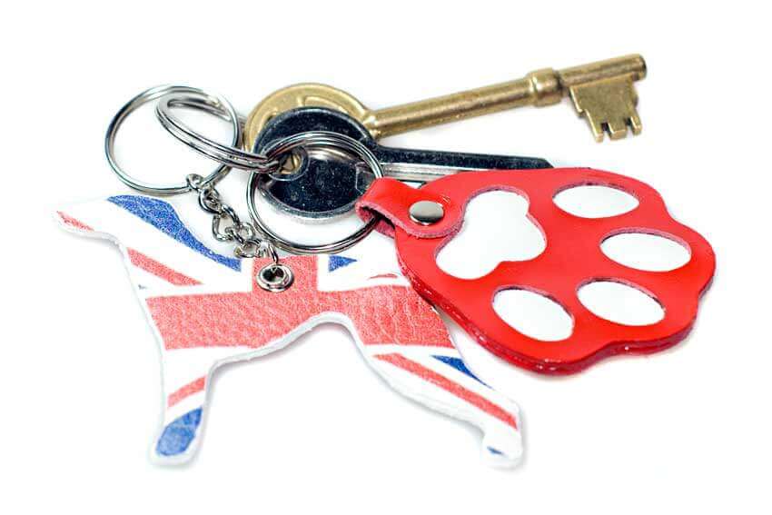 British whippet with red paw key fobs