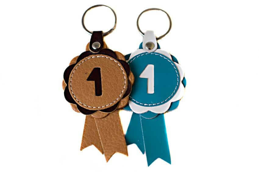 Winner show rosettes in beige and turquoise