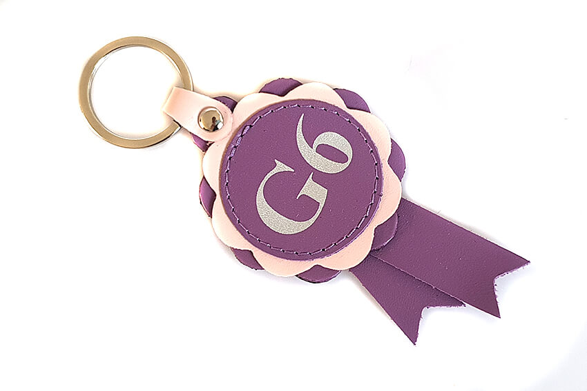 Lilac / Pink Agility grade 6 leather rosette keyring / bag charm